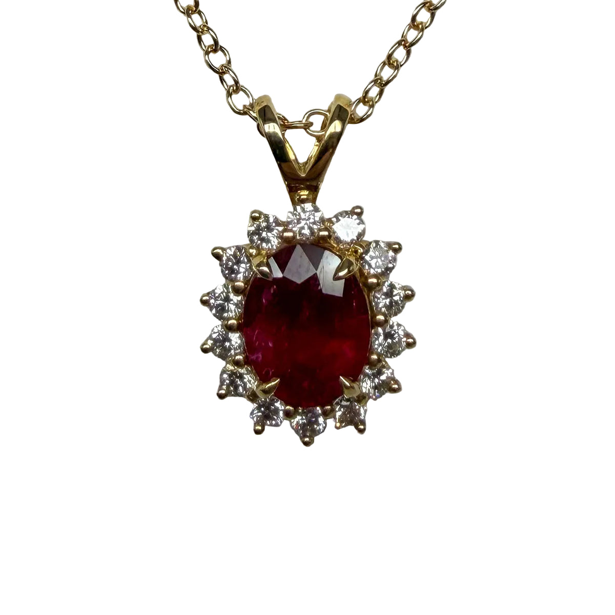 Oval Ruby Halo Pendant in 14K Yellow Gold with Diamond Halo