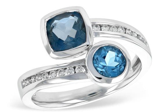 14k White Gold Blue Topaz and Diamond Bypass Ring - Warwick Jewelers
