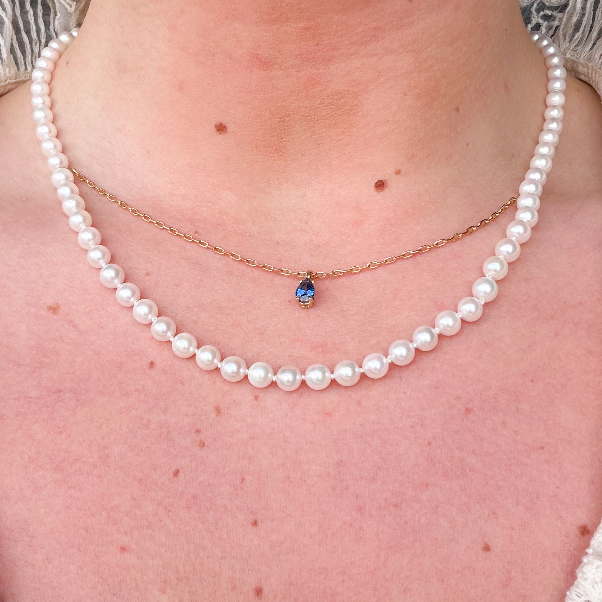 14kt Yellow Gold AAA Akoya Pearl Strand with Blue Sapphire Suspended Pendant 