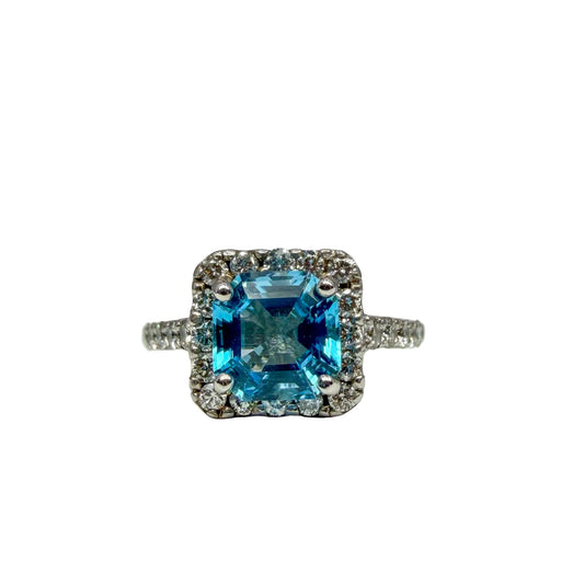 Blue Topaz and Diamond Halo Ring
