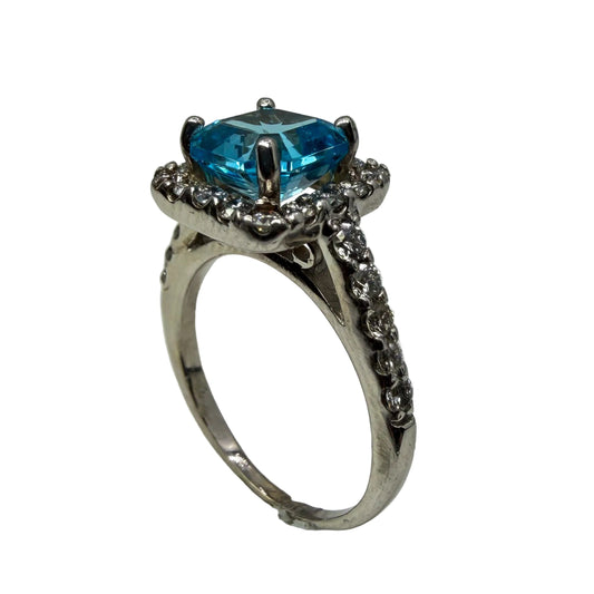 Blue Topaz and Diamond Halo Ring