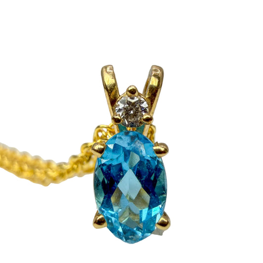 Blue Topaz and Diamond Necklace.