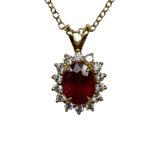 Oval Ruby Halo Pendant in 14K Yellow Gold with Diamond Halo
