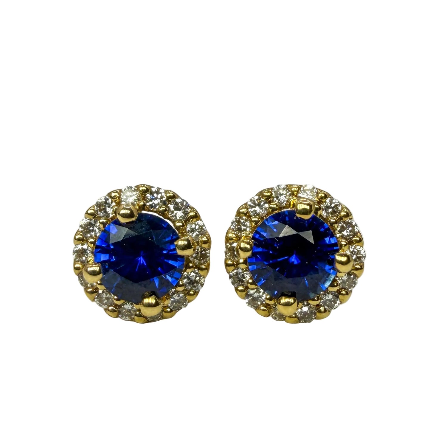 Sapphire and Diamond Halo Studs.